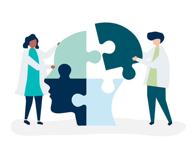 people-connecting-jigsaw-pieces-head-together_53876-59847