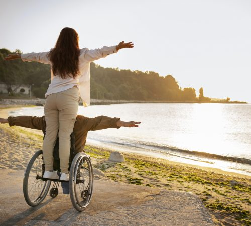 full-shot-disabled-man-woman-vacation
